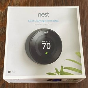 Nest programmable thermostat. Almost new!